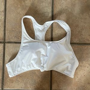 NWOT. Racer back, knot front bikini top